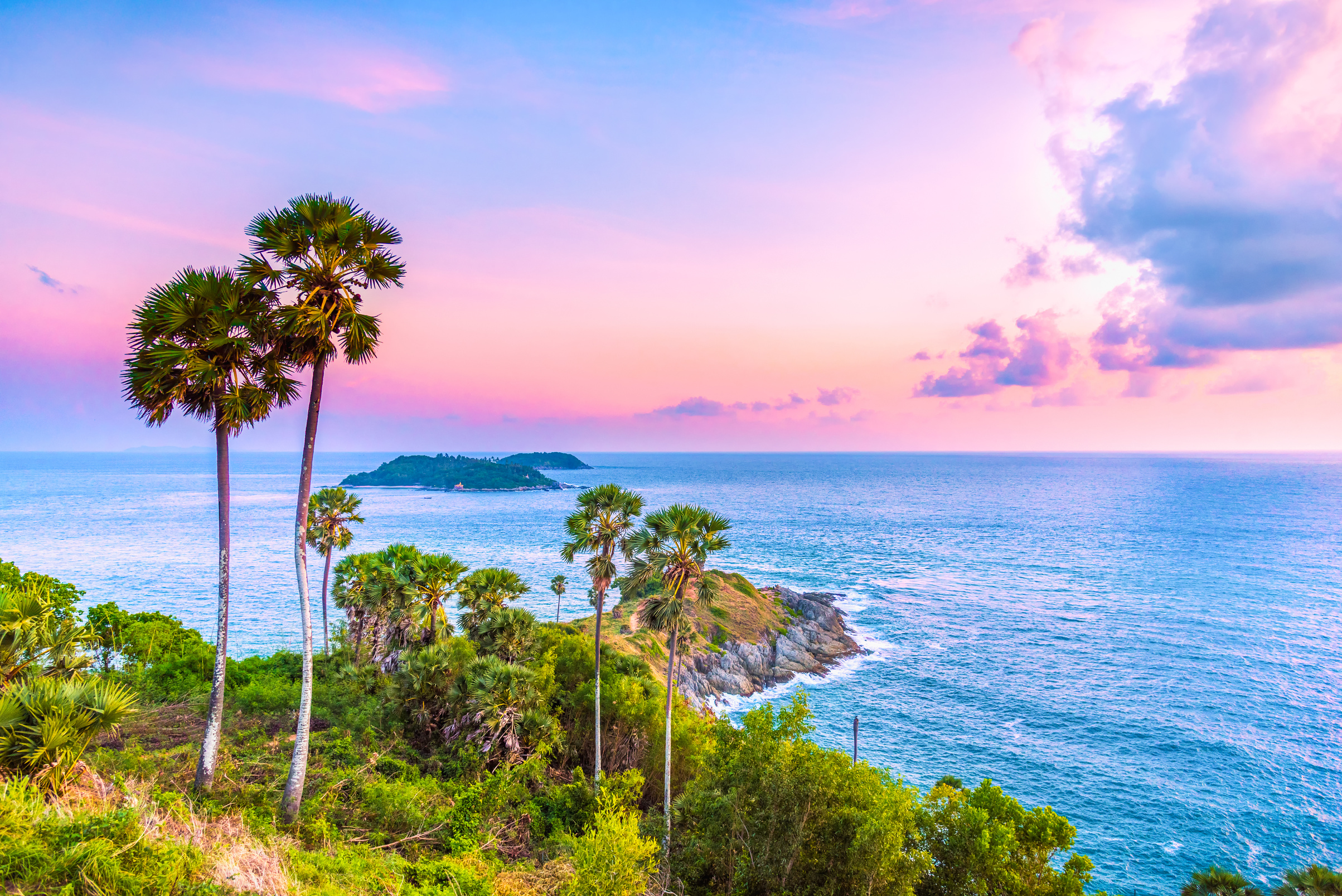 Landscape viewpoint of Laem Phromthep Cape at sunset sky. The most famous tourist attraction in Phuket province, Thailand.